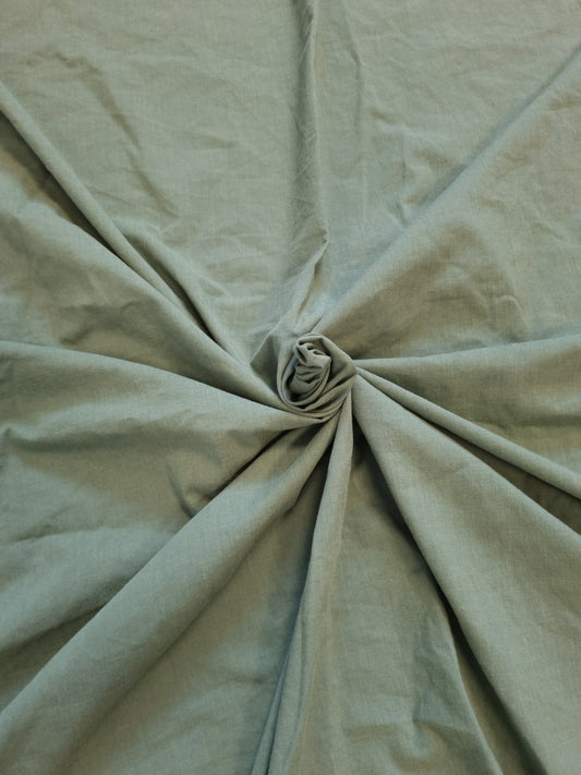 Grønt stoff 50/50 bomull og polyester.