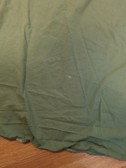 Grønt stoff 50/50 bomull og polyester.