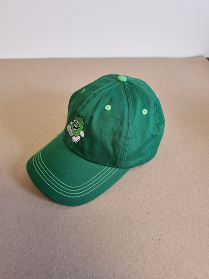 Grønn caps fra Kiwi