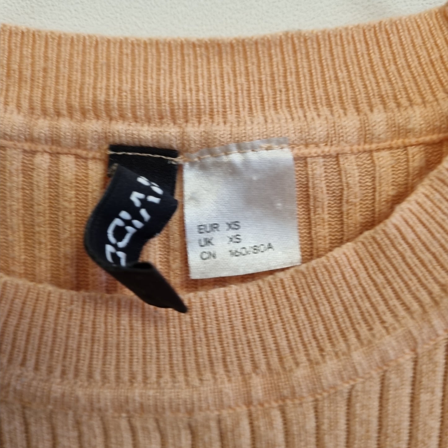 Ferskenfarget ribbet topp - XS