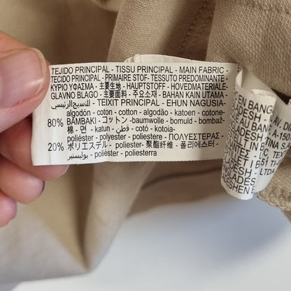 Beige topp med høy hals - M