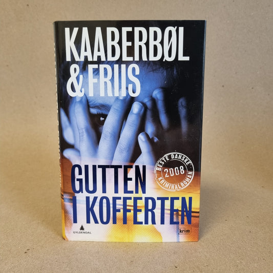 Gutten i kofferten – Kaaberbøl & Friis